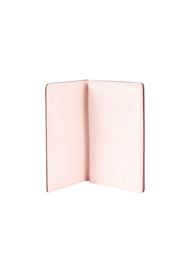 Carteira modular em couro legítimo nas cores burgundy e rosa com bolso removível prático e compartimentos internos para cartões, estrutura inteligente com compartimentos estratégicos, unindo versatilidade e o melhor do design contemporâneo.